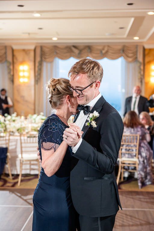 groom and mom dancing