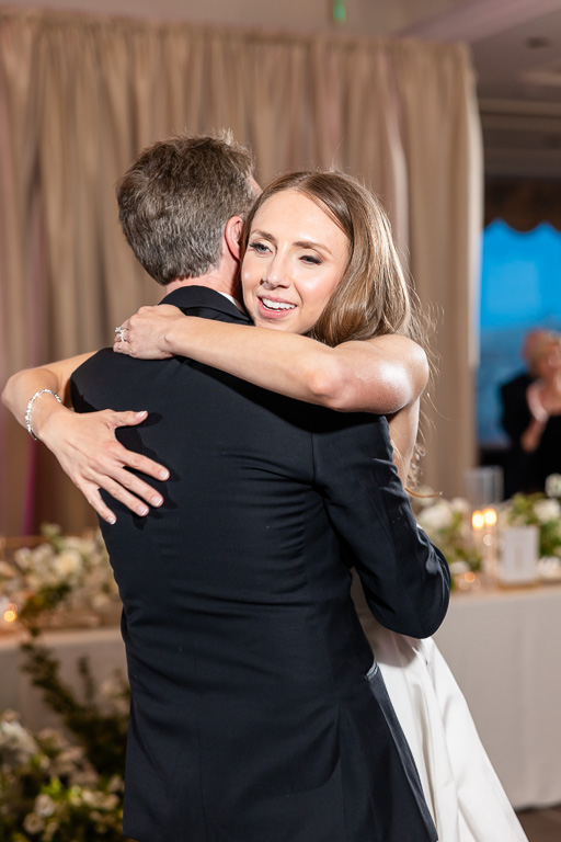 bride hugging dad