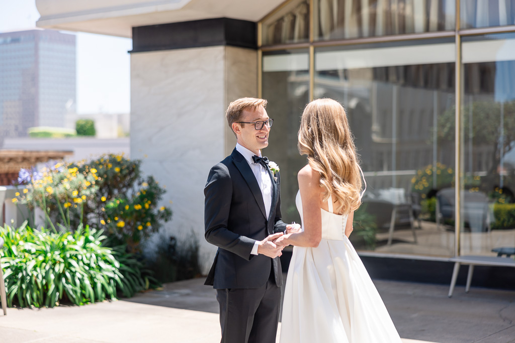 bride and groom sharing a first look moment