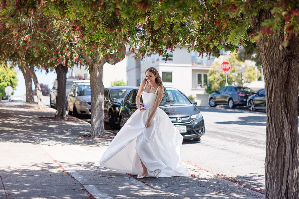 candid moment of bride arriving at the wedding ceremony