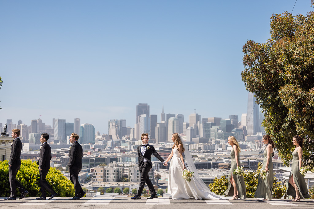 full bridal party photo crossing a crosswalk at Potrero Hill