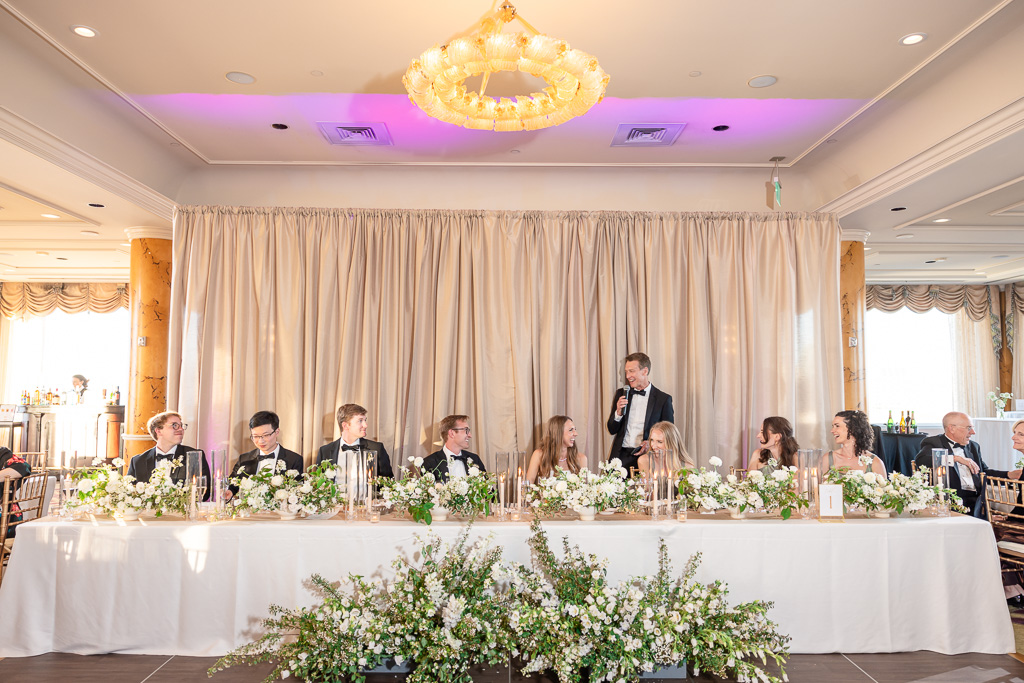 dad giving a speech during wedding reception