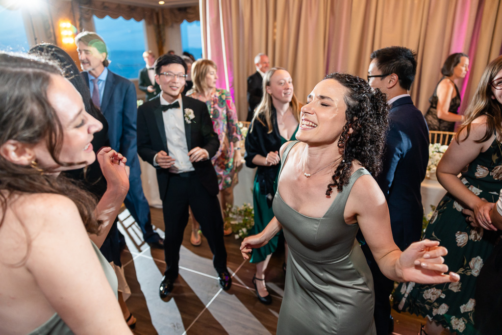 guests partying at wedding reception in the Crown Room