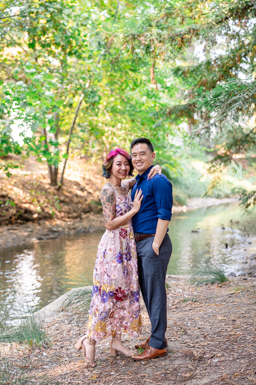 engagement photos at a lake in the woods