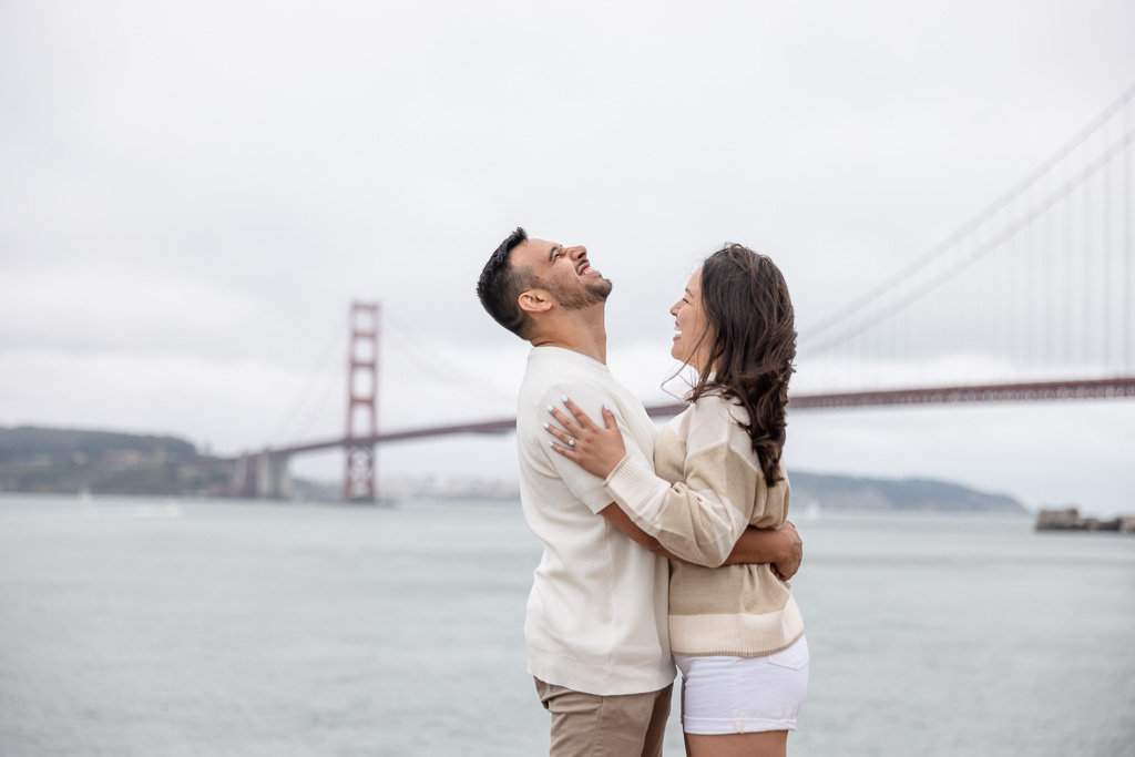 cute engagement photos at the Golden Gate Bridge