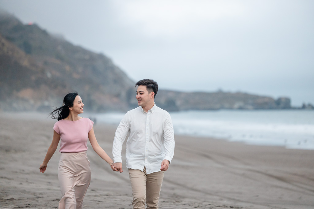 couple walking along the beach