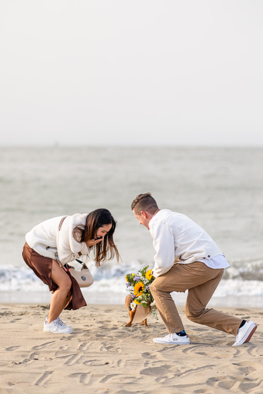 bride’s hand covering her mouth in surprise