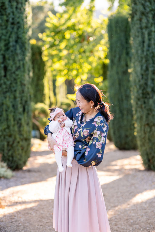 mother and baby daughter at golden hour