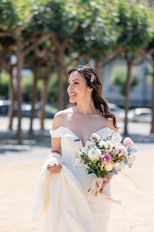 beautiful bride solo portrait with floral bouquet