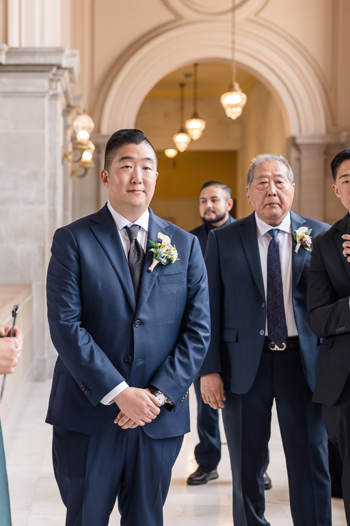 groom standing at the altar at City Hall