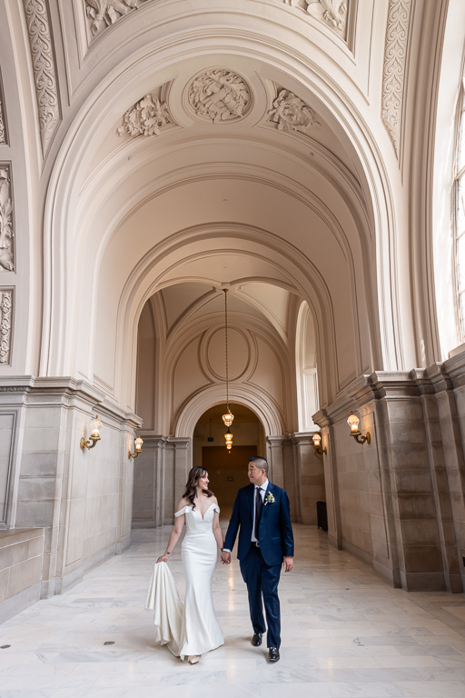 wedding photo in the fourth floor hallway of SF City Hall