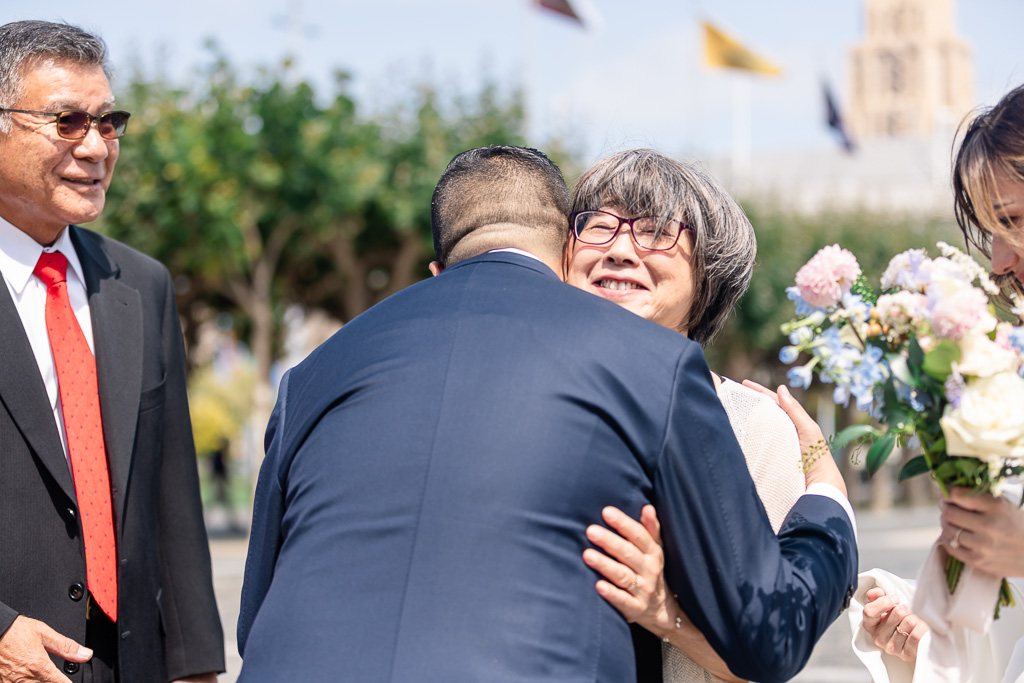 groom greeting a relative