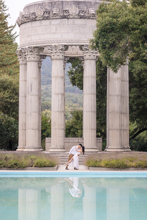 dramatic dip engagement photo at Pulgas Water Temple