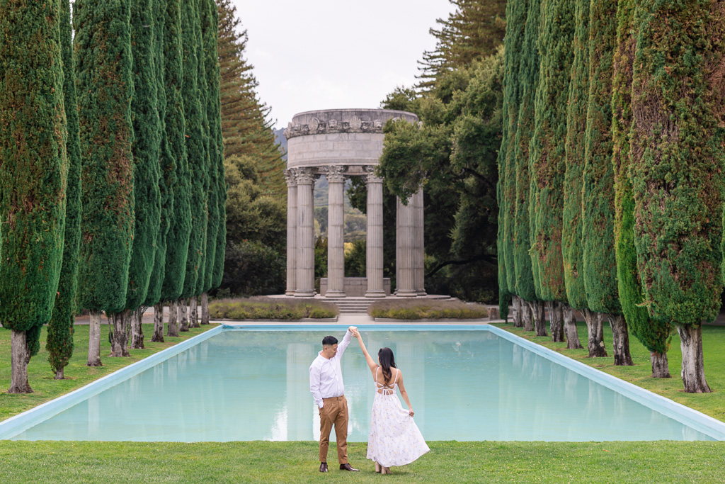 Pulgas Water Temple engagement session dancing in front of the pool