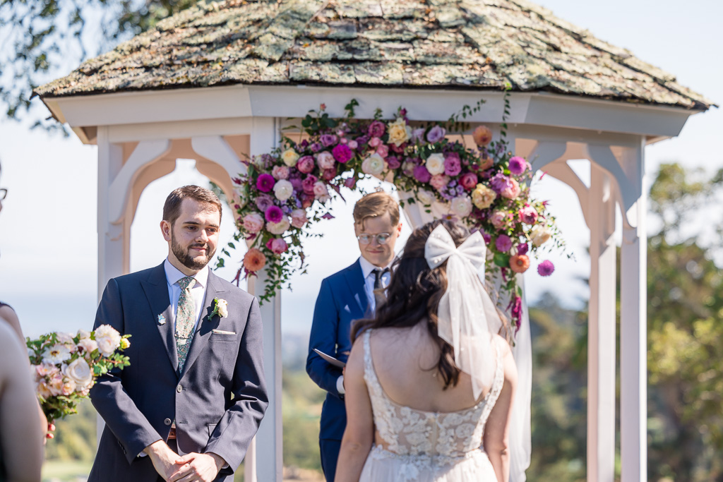 groom receiving the bride