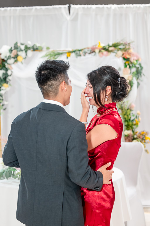 candid moment between bride and groom