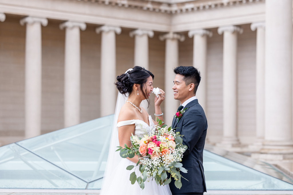 bride wiping a tear away at the Legion of Honor