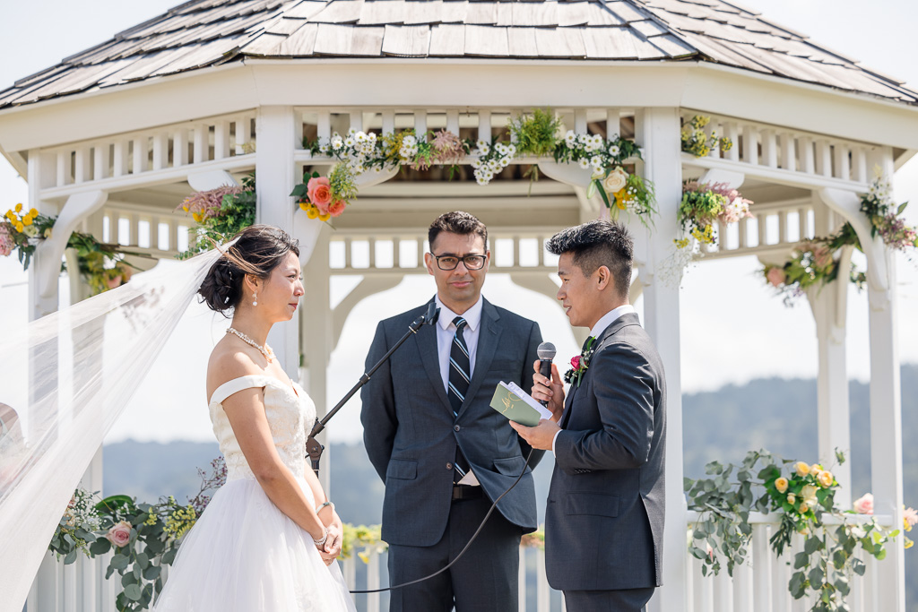 groom delivering personal vows to his bride