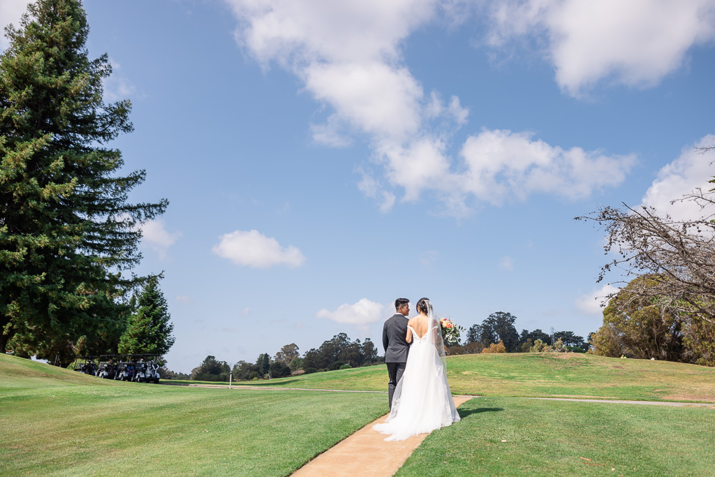 bride and groom exiting the ceremony alone