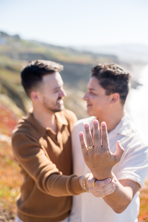 photo of the new engagement ring on his finger