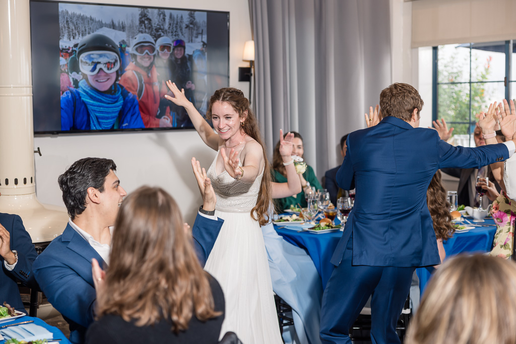 guests congratulating and celebrating with the bride and groom at the reception