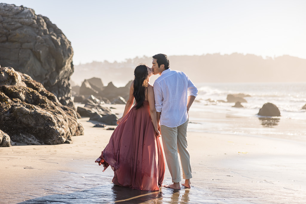 beach engagement photos during golden hour