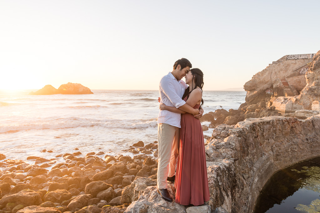 couple posing during sunset at Sutro Baths