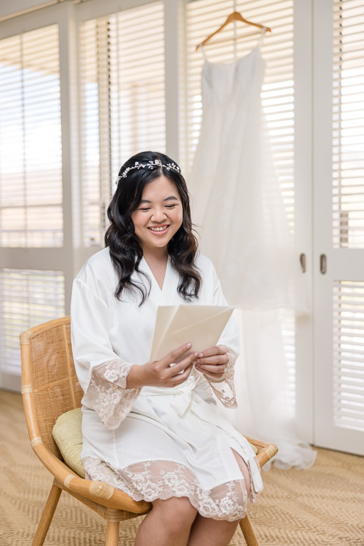 bride looking at her written vows