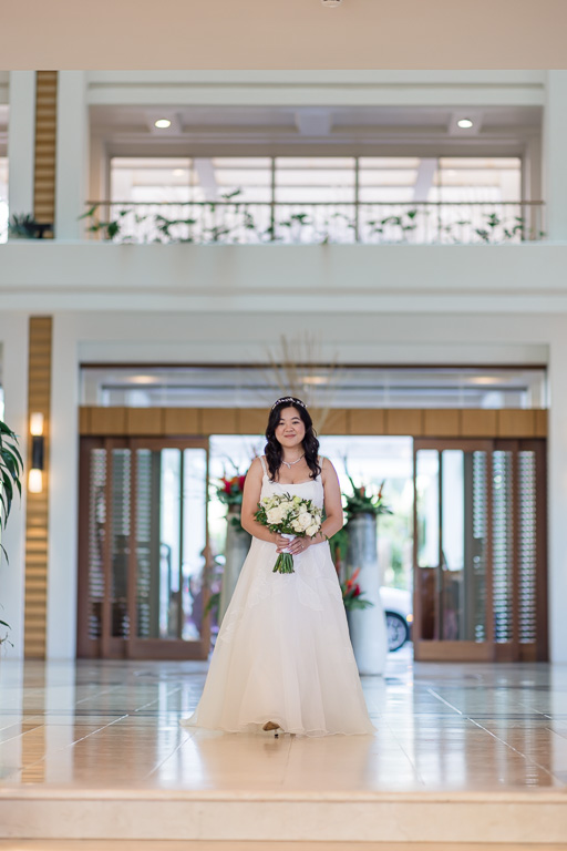 bride walking across hotel lobby