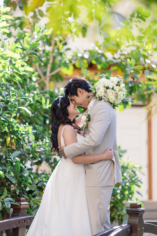 wedding portrait of the couple in garden of Four Seasons Oahu