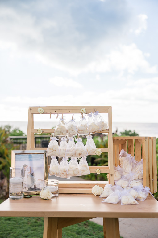 table with flower petals for wedding ceremony tossing