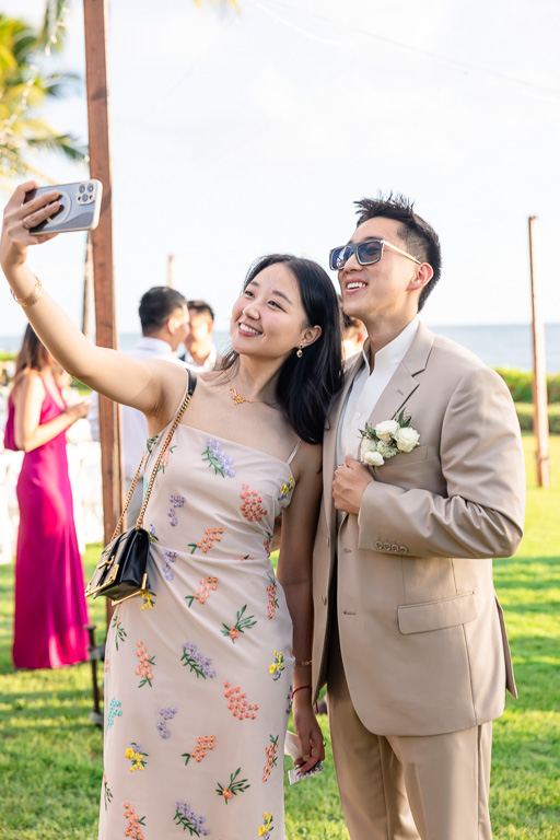 candid shot of a couple taking a selfie