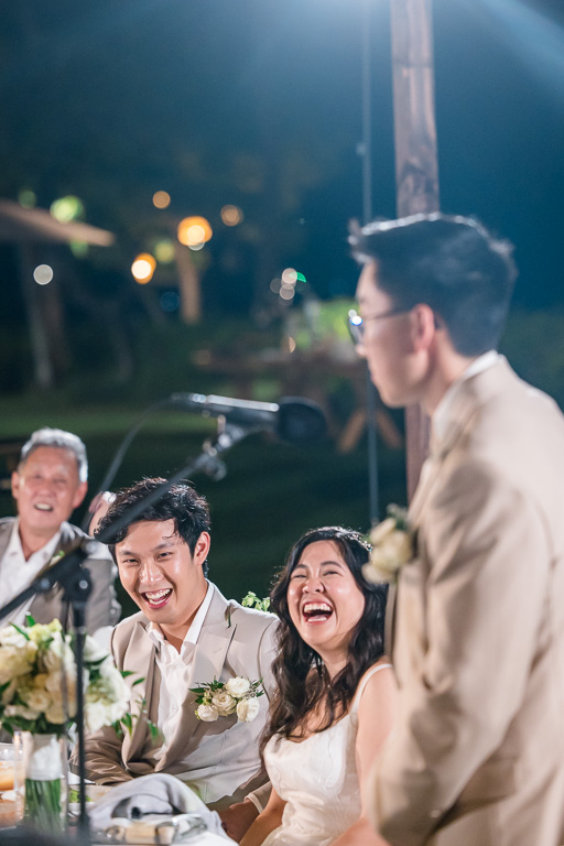 dinner toast bride and groom reaction photo