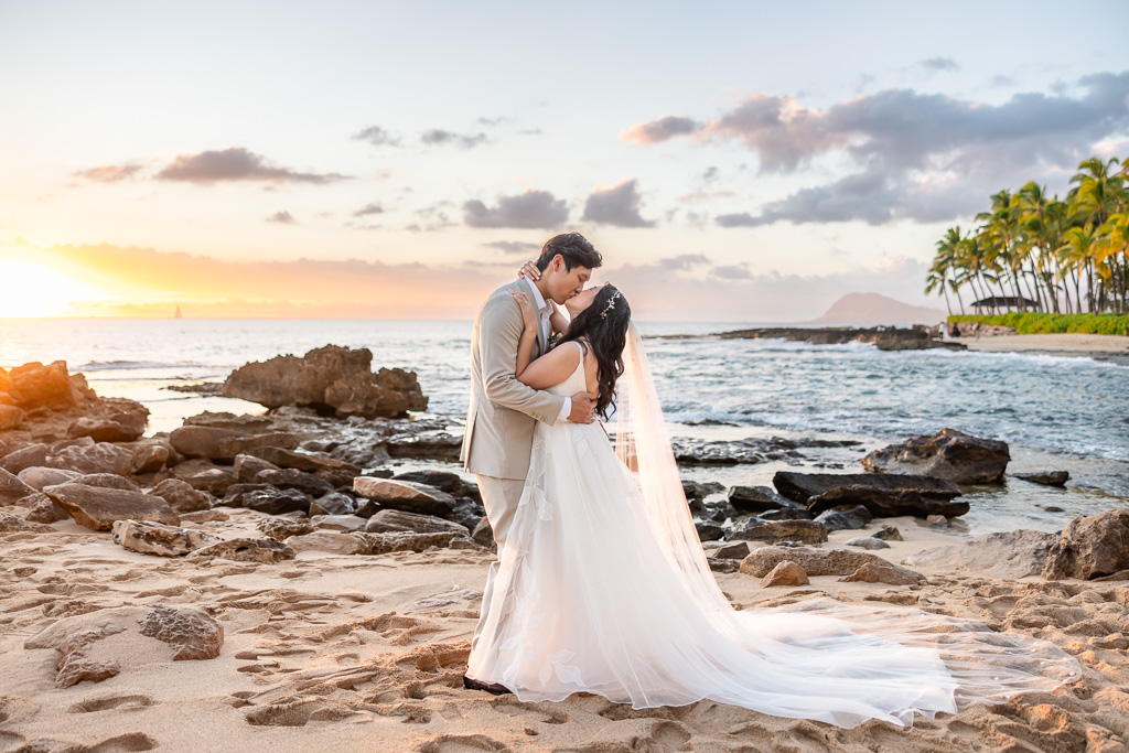 Oahu sunset wedding photos on the beach by the ocean