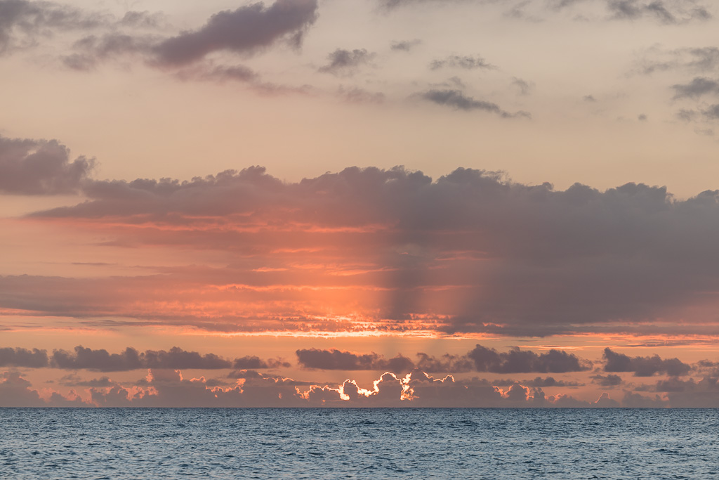 last seconds of sunset over the ocean in Hawaii