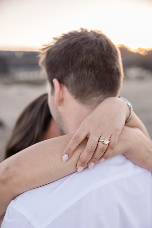 a close-up portrait photo of the engagement ring