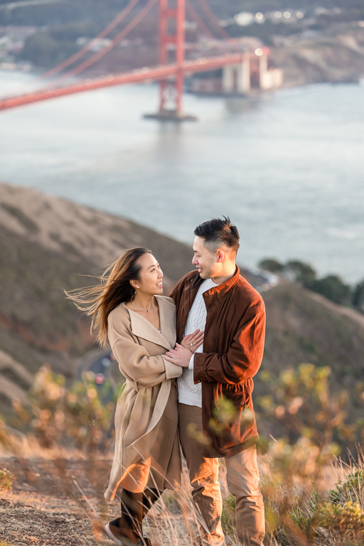 engagement photos at a Golden Gate Bridge viewpoint