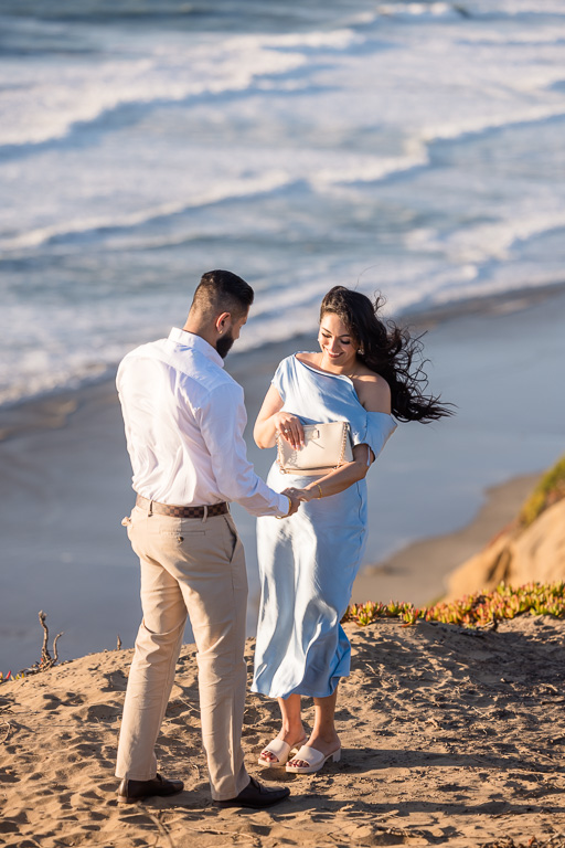 looking at the ring after engagement