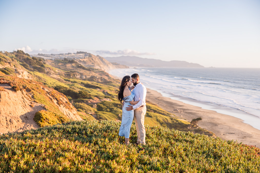 engagement photos with a sweeping view of the Pacific coastline