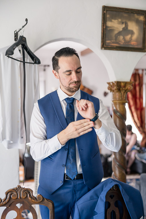 groom putting on his watch