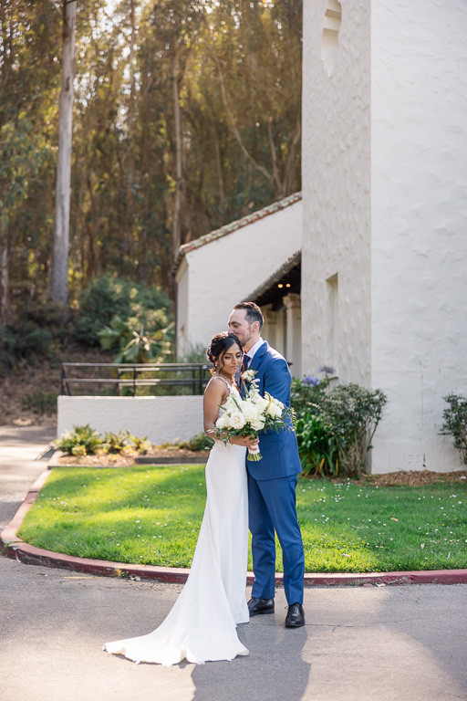 a sun-lit, candid capture of the bride and groom on their wedding day at Golden Gate Club