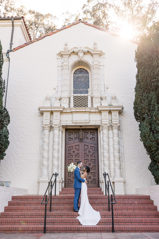 Presidio Chapel wedding portrait of bride and groom with romantic golden sunlight