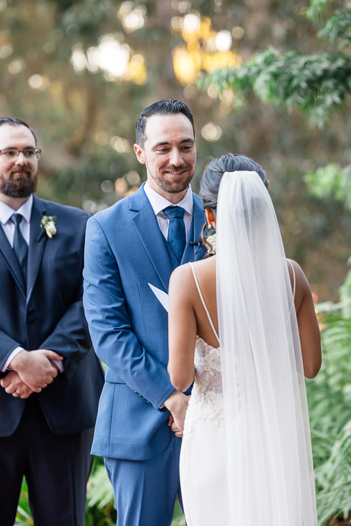 groom's reaction to bride's vows during wedding ceremony