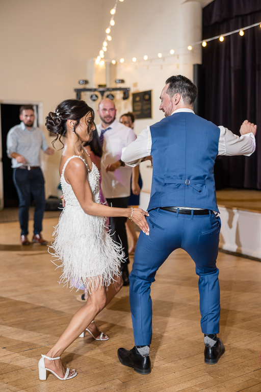 bride giving groom a playful slap