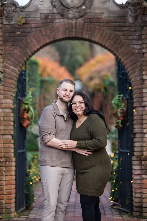 couple at the Filoli arch gate