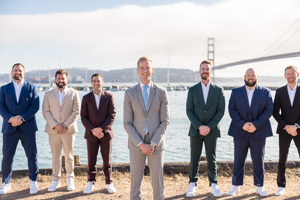 groom with color-coordinated groomsmen