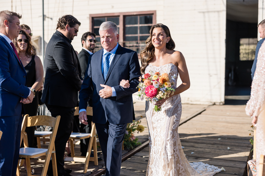 father of the bride walking his daughter up the aisle