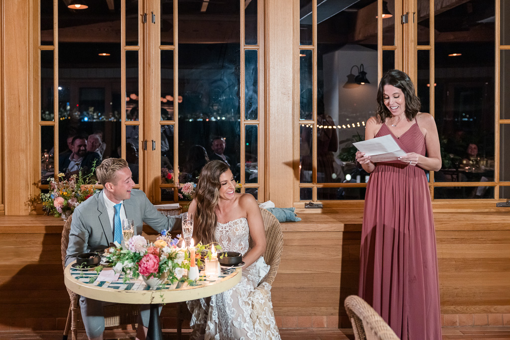 bridesmaid giving a speech during dinner at The Bungalow Kitchen