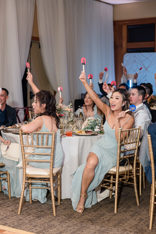 guests cheering for the bride and groom