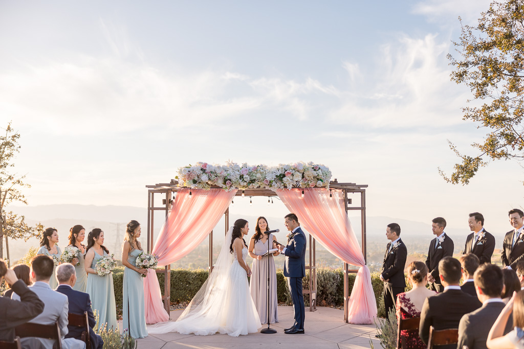 wedding ceremony at Boulder Ridge by Wedgewood Weddings in San Jose during golden hour